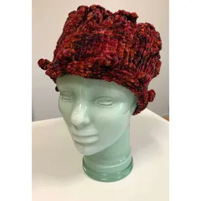 Hand knit soft bulky textural cotton chenille hat in burnt red color with popcorns.