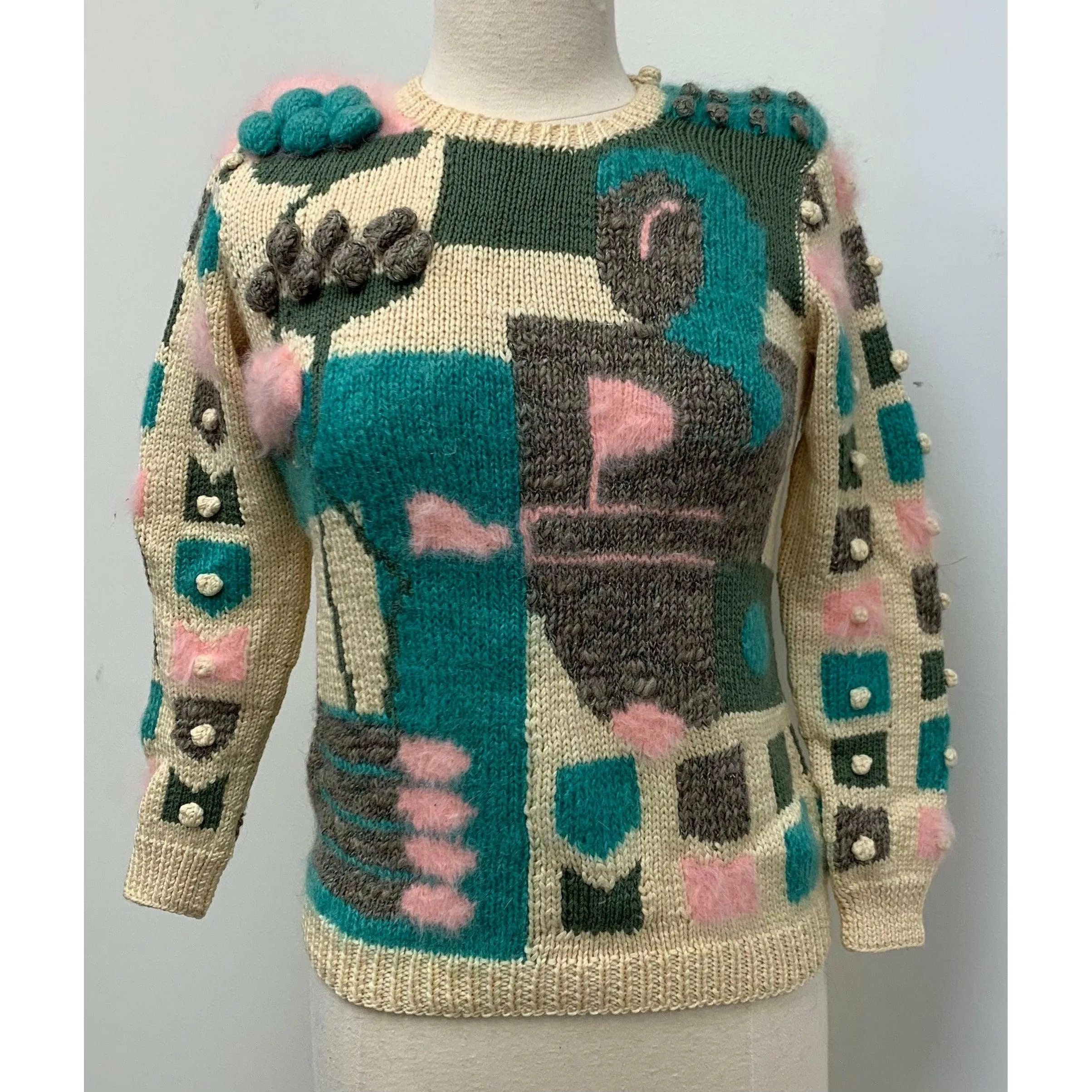 Womens 1980s hand knit pullover sweater. Couture yarns. Intricate knitting on small needles.  SMALL